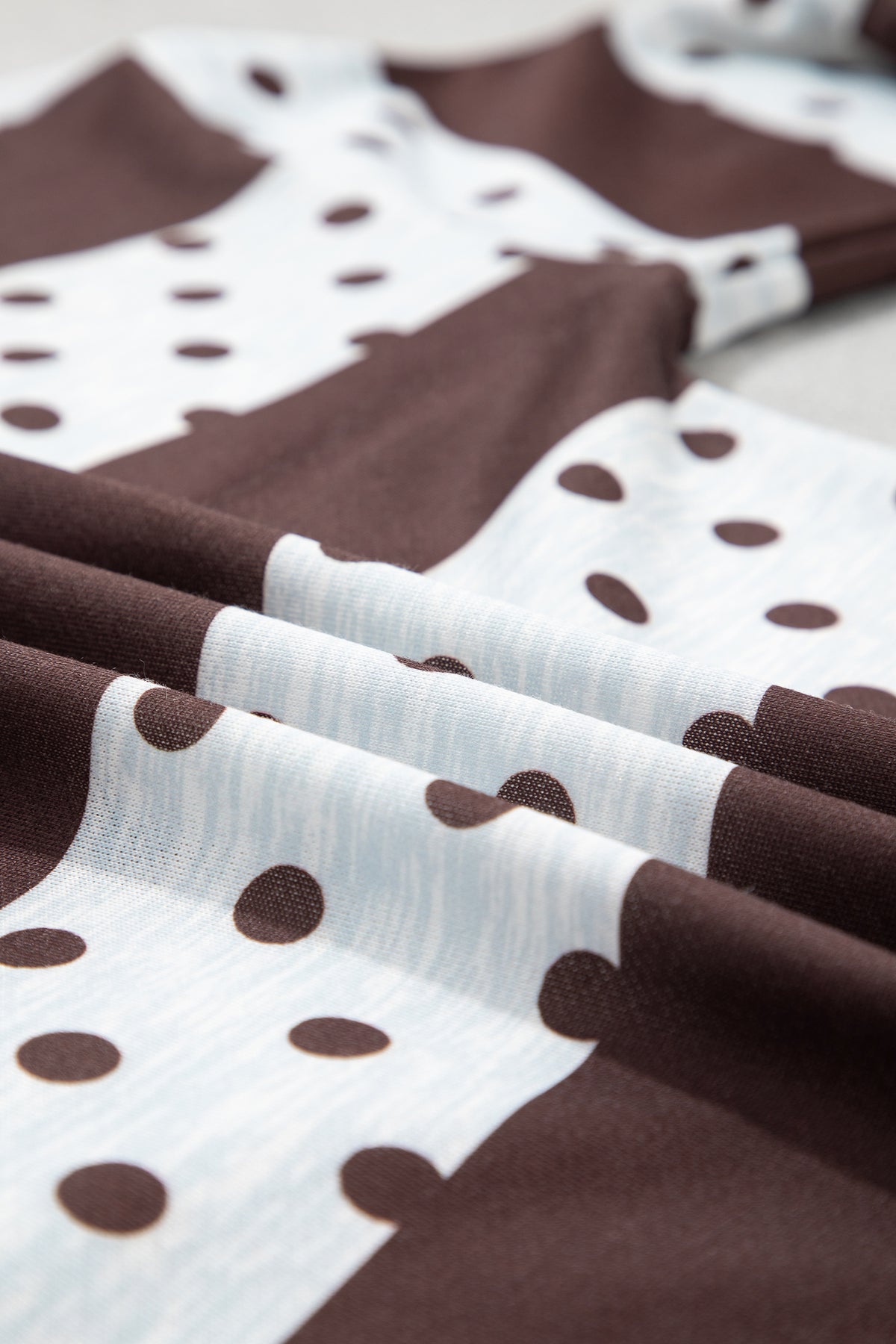 Sweet Spot brown and white polka dot quarter zip pullover