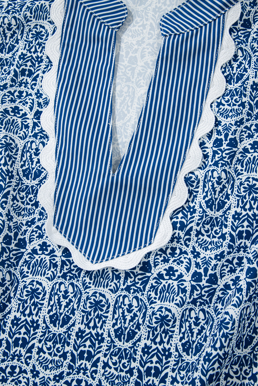 Blue Belle floral print puff sleeve blouse with ric rac trim