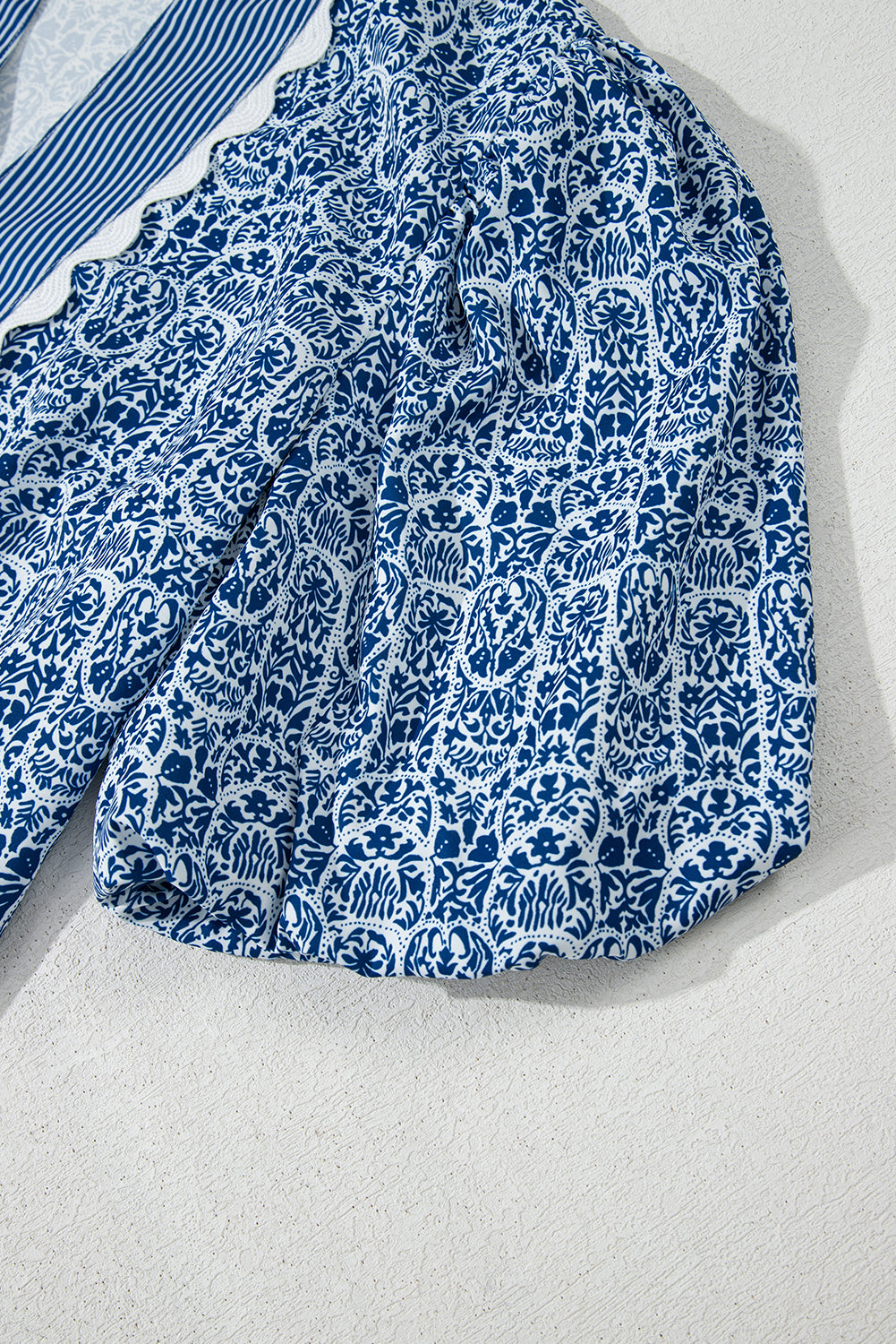 Blue Belle floral print puff sleeve blouse with ric rac trim