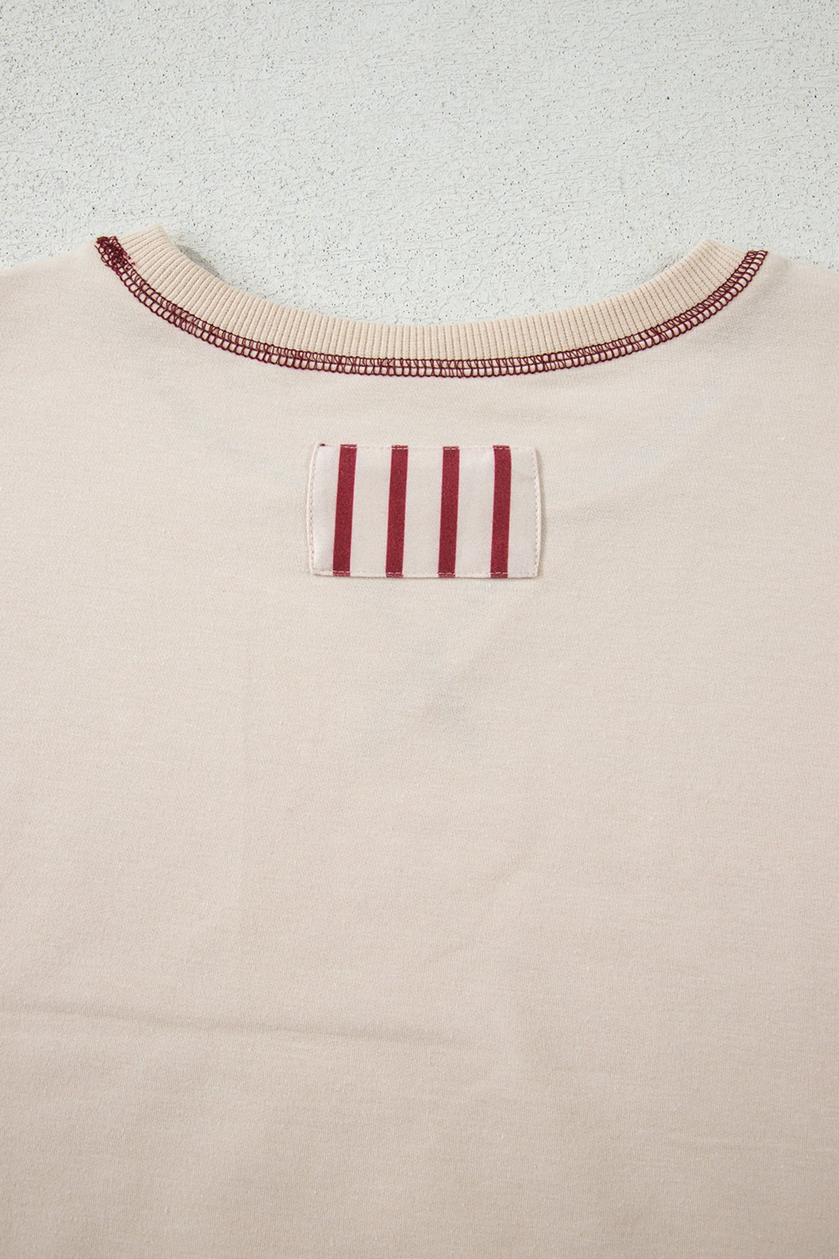Cream and rust striped sleeve patchwork top