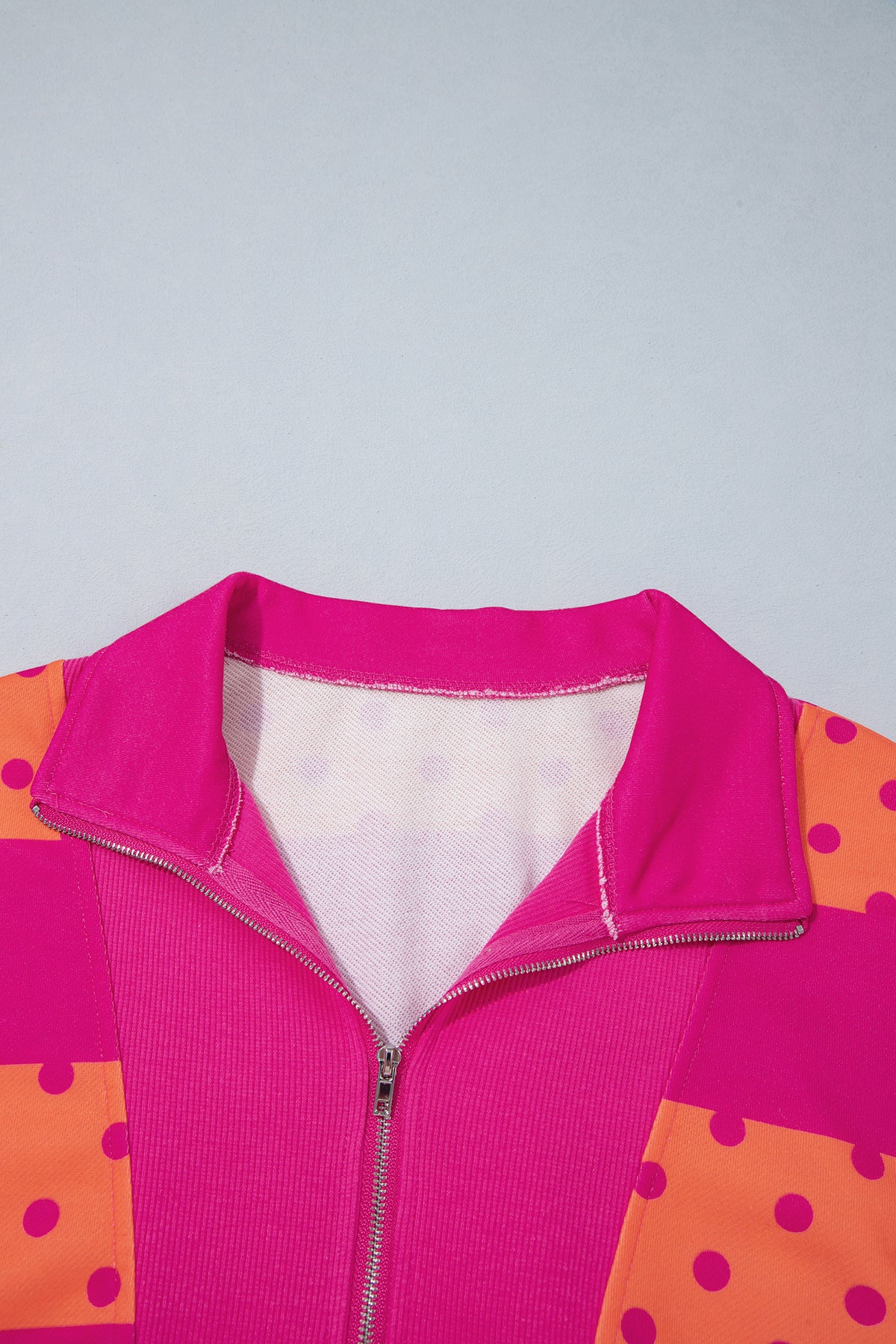 Peachy Keen pink and orange polka dot quarter zip pullover